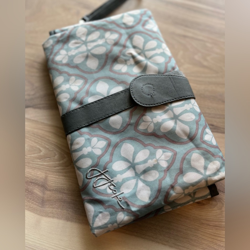 JJ Cole.  Diaper changing pad.  Blue and white.